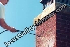 Carbon monoxide safety inspection on gas chimney in Locust Valley, New York